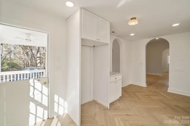 view of a bathroom with a glass door shower