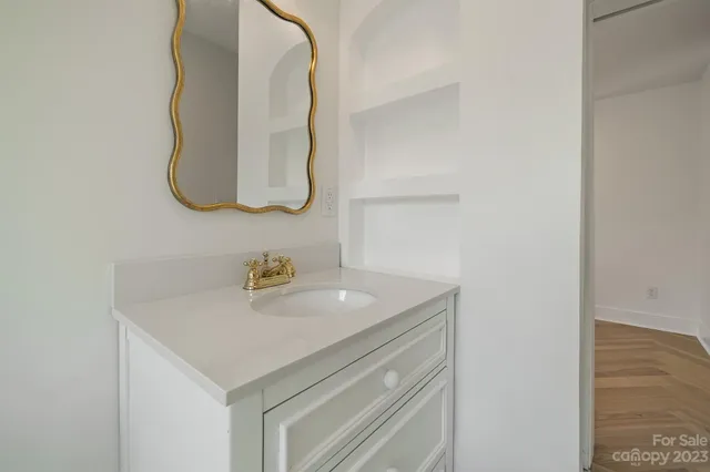 a bathroom with a sink toilet and a bathtub