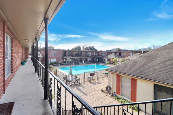 a front view of a building with a porch