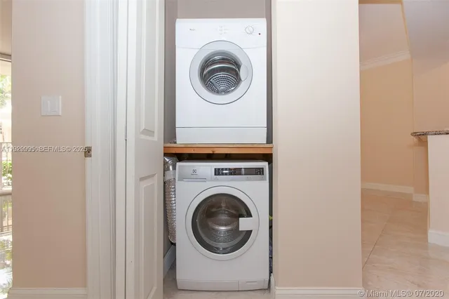 a front view of a house with street from a balcony