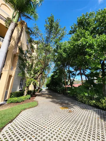 a kitchen that has a sink and a stove