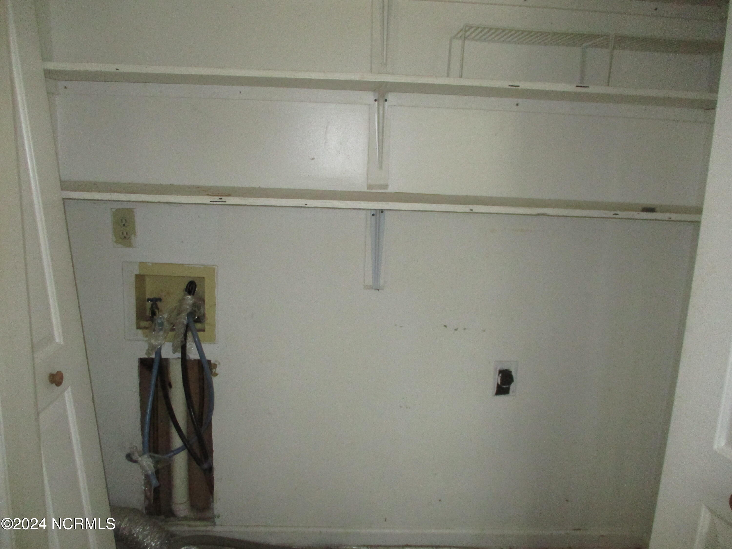 9821 Turnpike Road Laurinburg, NC 28352 - Photo 14 of 19 Laundry Closet