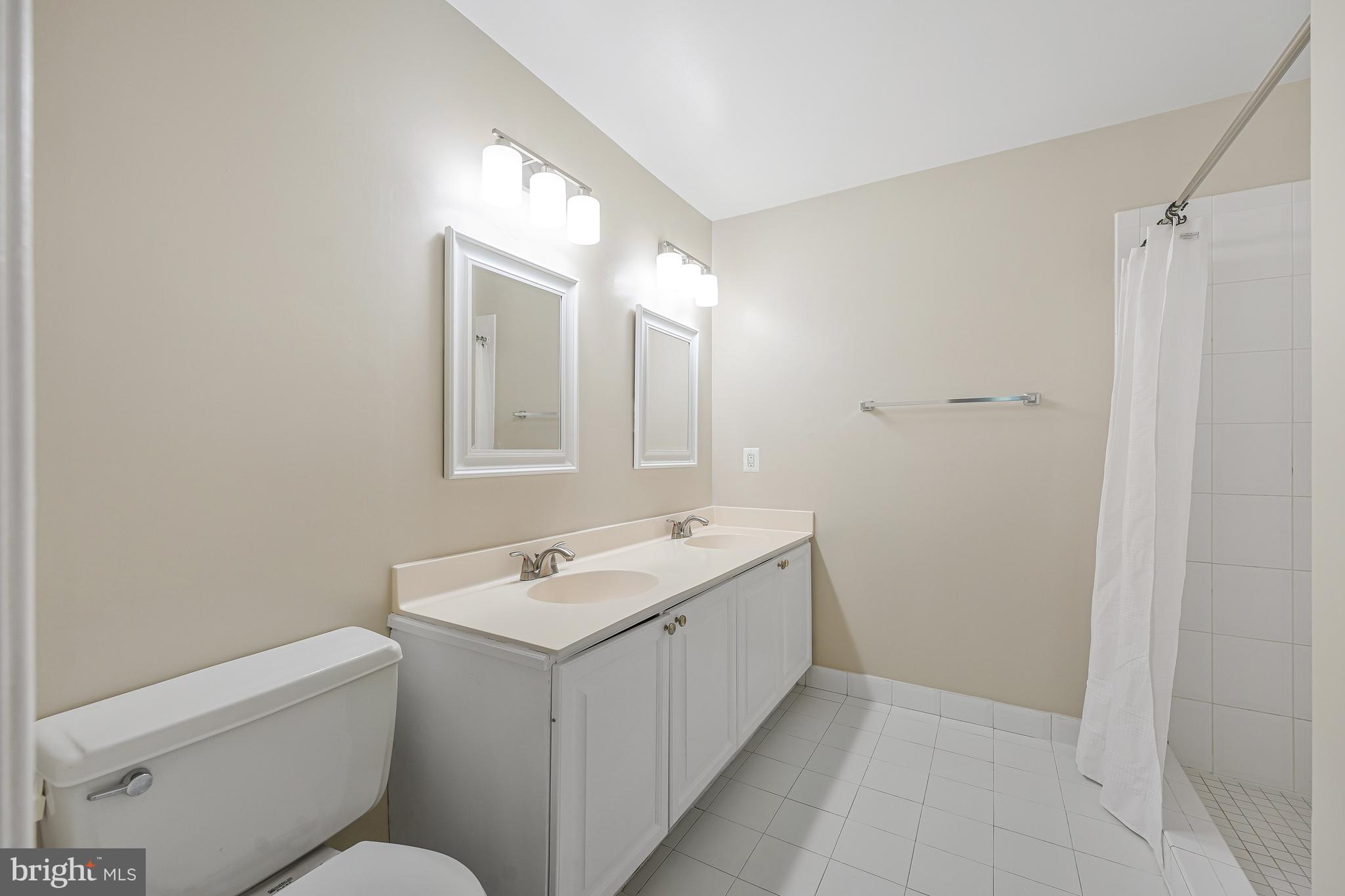 8530 Raglan Road Vienna, VA 22182 - Photo 22 of 59 Primary bathroom w/ double vanity