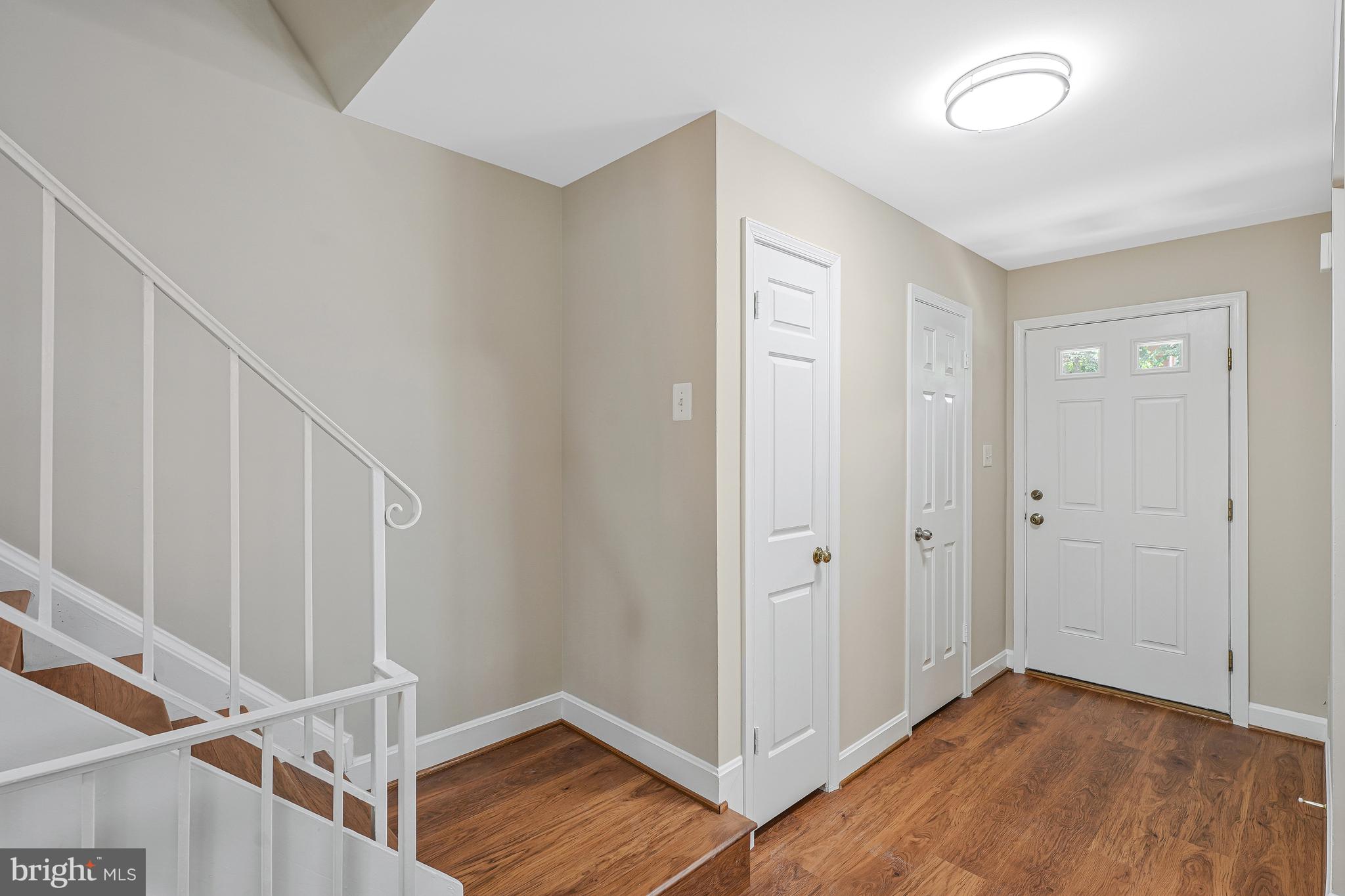 8530 Raglan Road Vienna, VA 22182 - Photo 4 of 59 Entry with half bath and coat closet