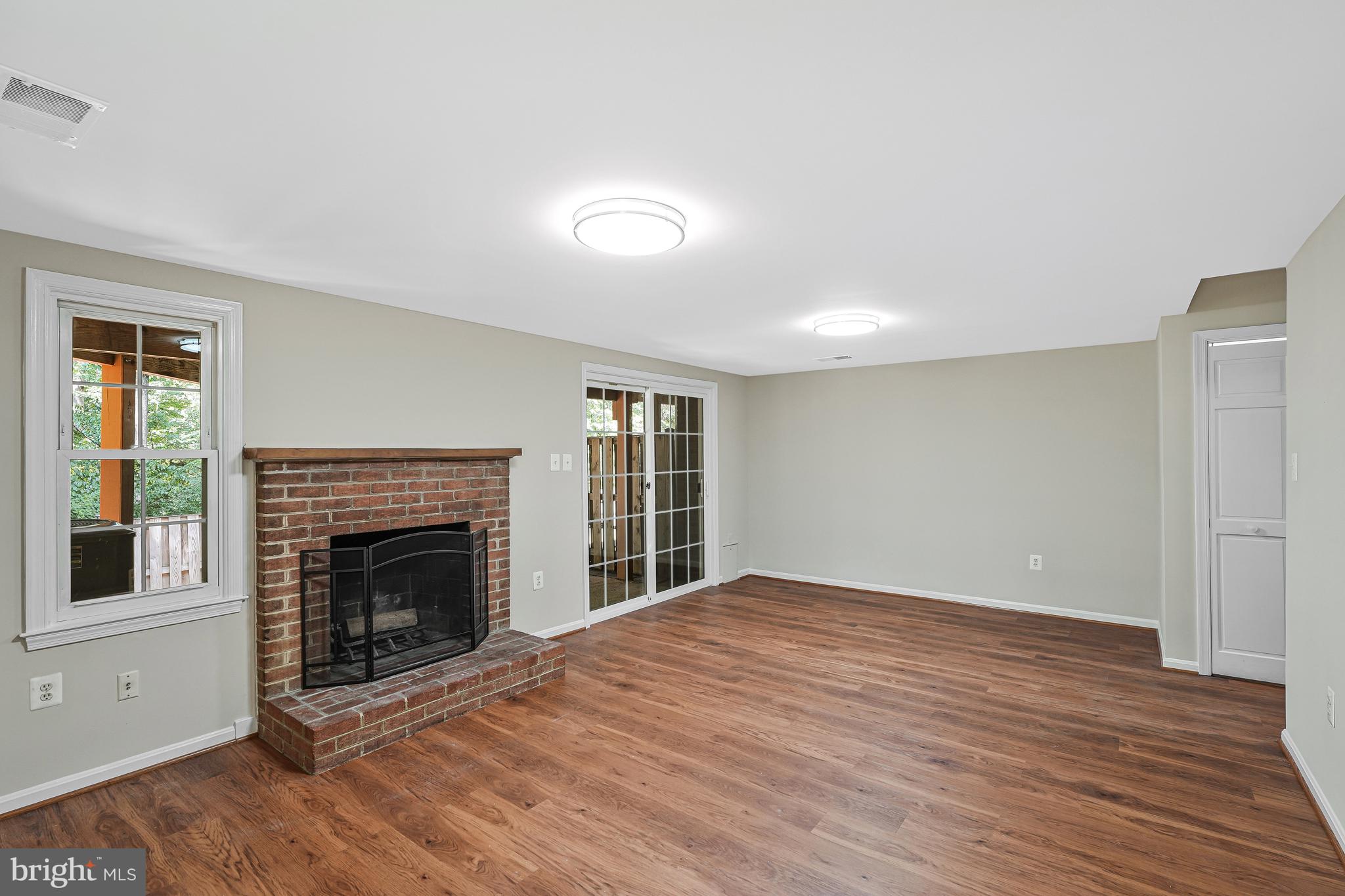 8530 Raglan Road Vienna, VA 22182 - Photo 41 of 59 Family room w/ wood burning fireplace