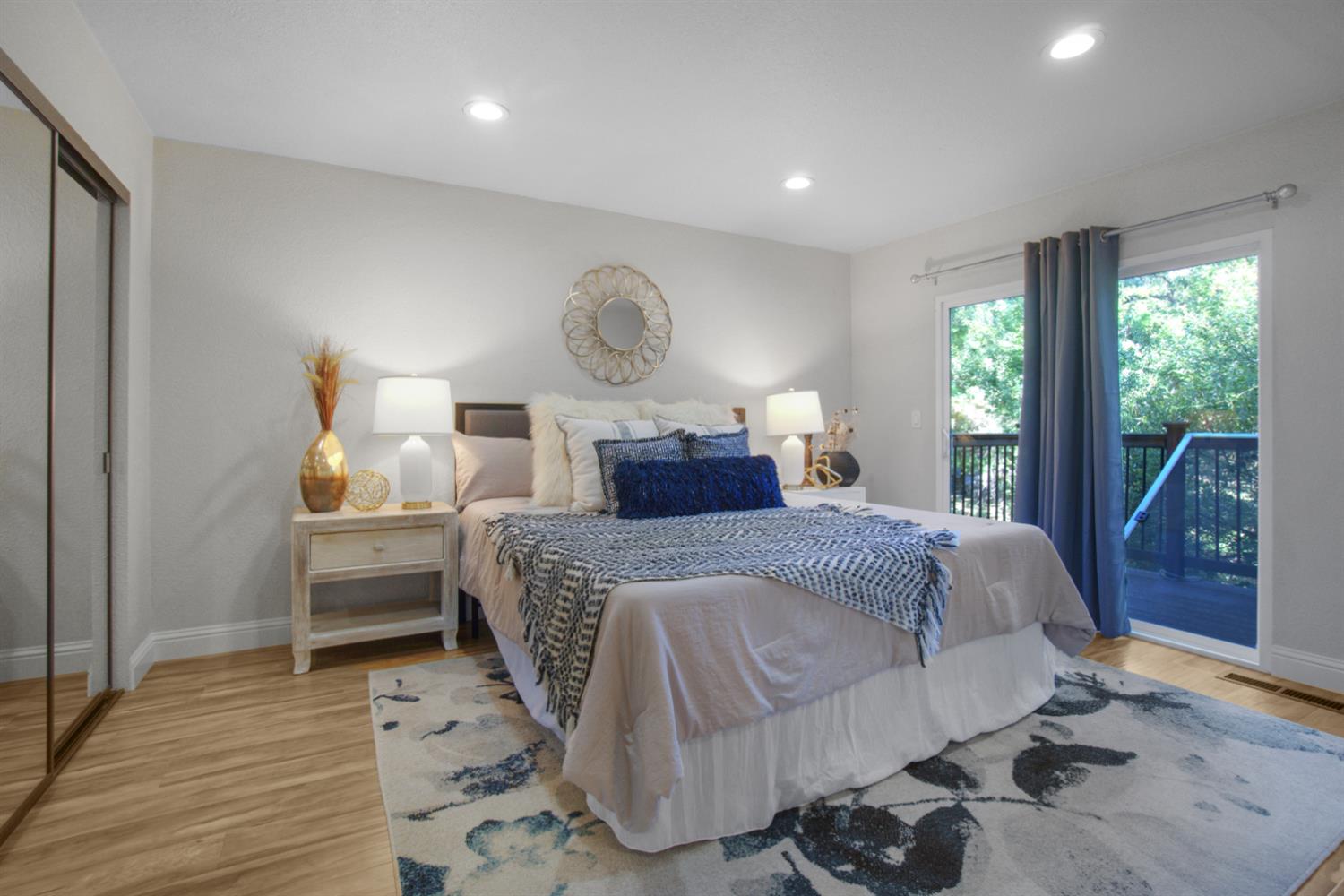 6299 Horseshoe Bar Road Loomis, CA 95650 - Photo 18 of 43 a bedroom with a bed and wooden floor