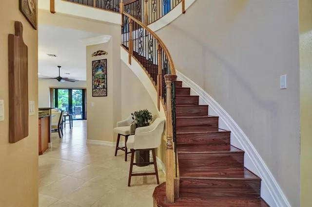 a kitchen with stainless steel appliances granite countertop a sink a counter space and cabinets