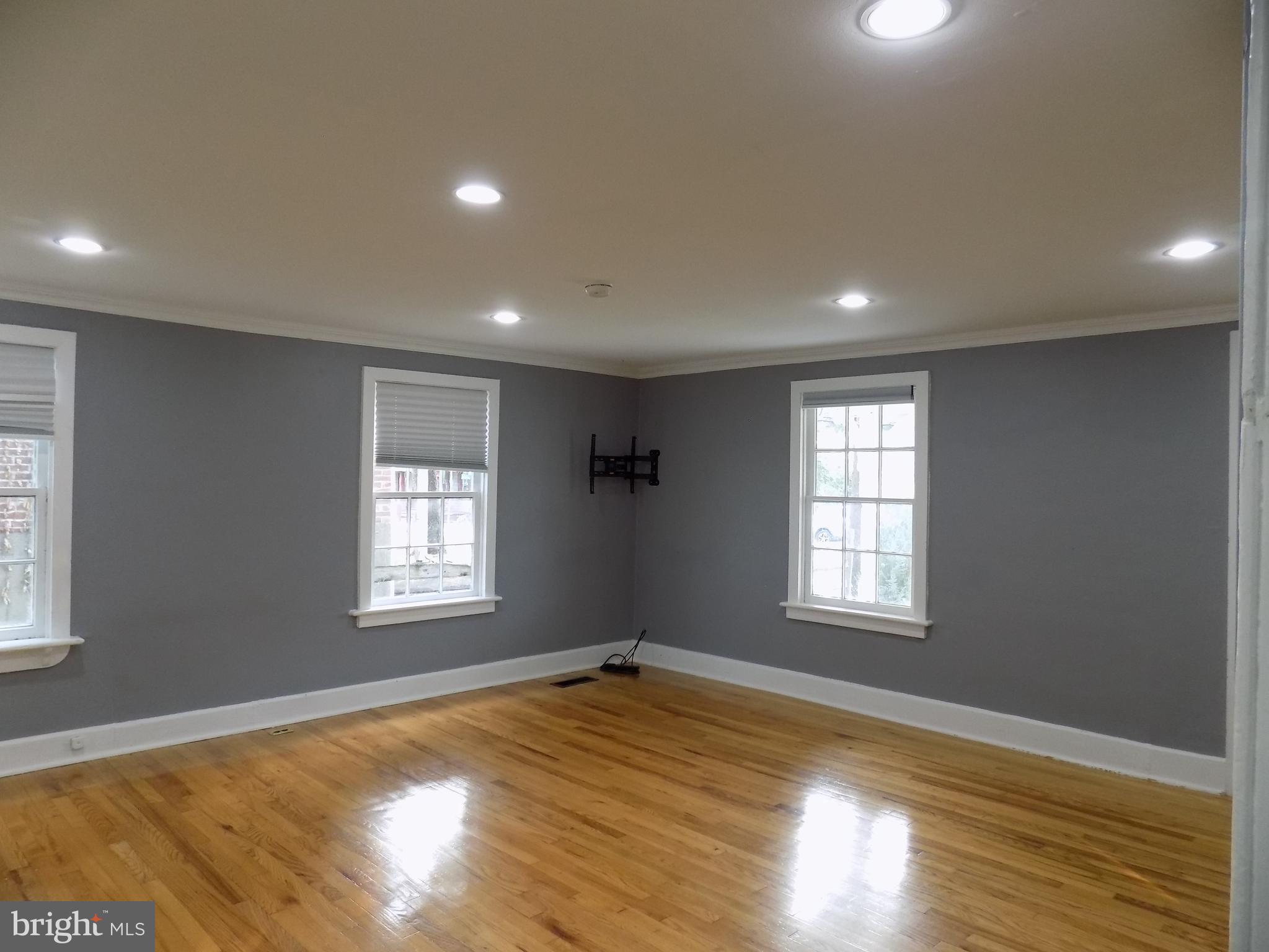 3103 Bedminster Road Ottsville, PA 18942 - Photo 8 of 22 a view of empty room with wooden floor and fan