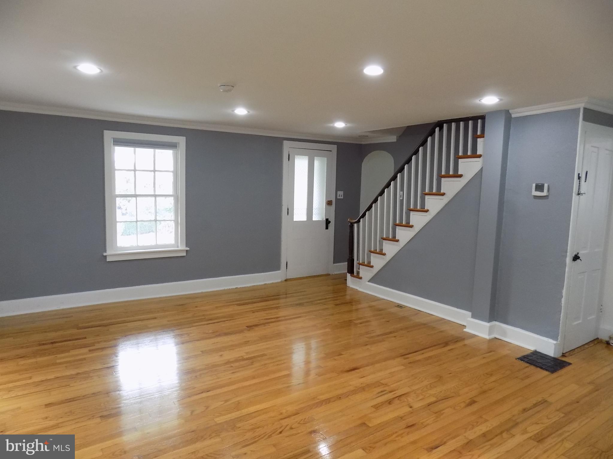 3103 Bedminster Road Ottsville, PA 18942 - Photo 9 of 22 a view of empty room with wooden floor and fan