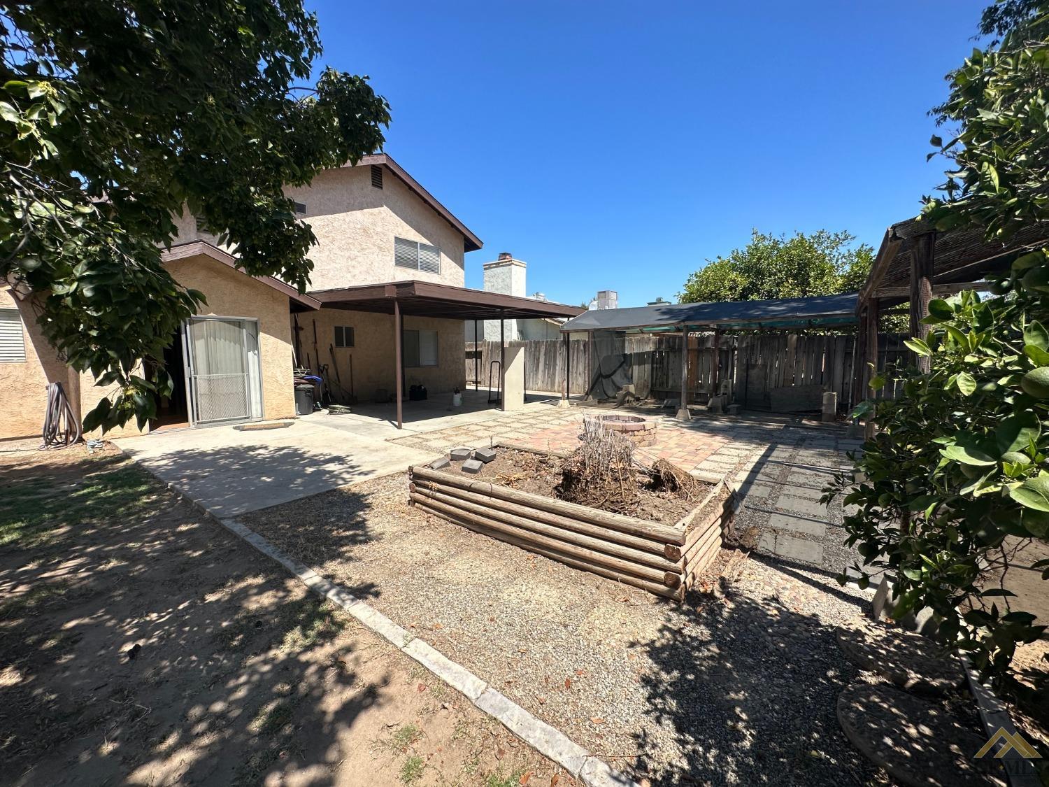 Undisclosed Address Bakersfield, CA 93313 - Photo 27 of 30 a house view with a outdoor space