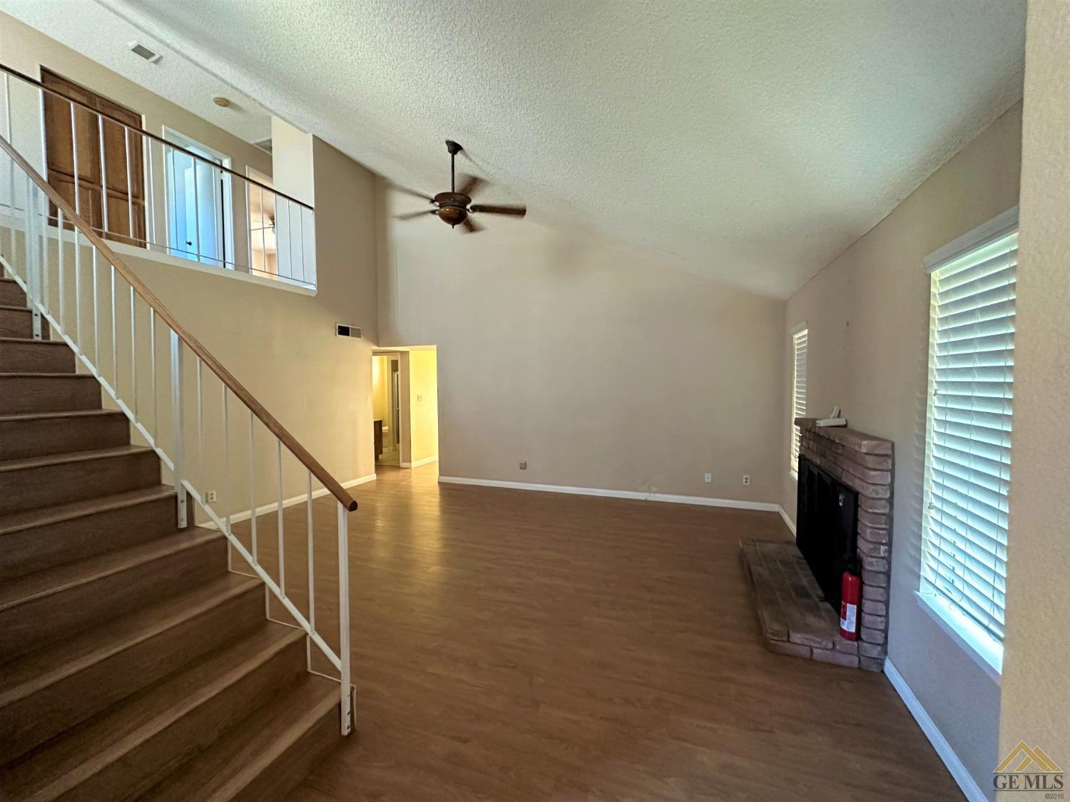 Undisclosed Address Bakersfield, CA 93313 - Photo 4 of 30 a view of entryway and hall with wooden floor