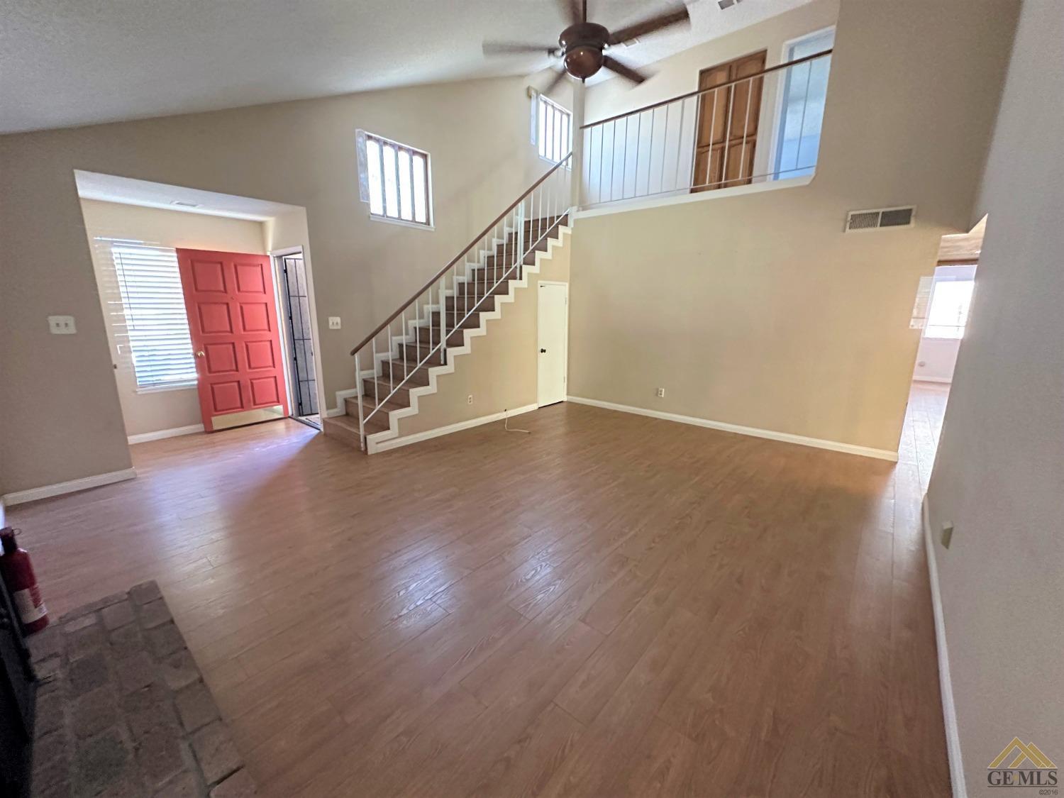 Undisclosed Address Bakersfield, CA 93313 - Photo 5 of 30 a view of an entryway with wooden floor