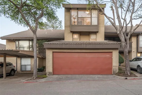 a house with trees in front of it