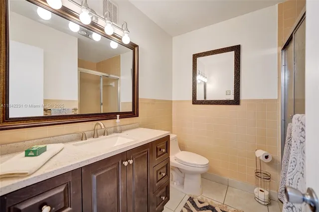 a view of a livingroom with furniture and staircase