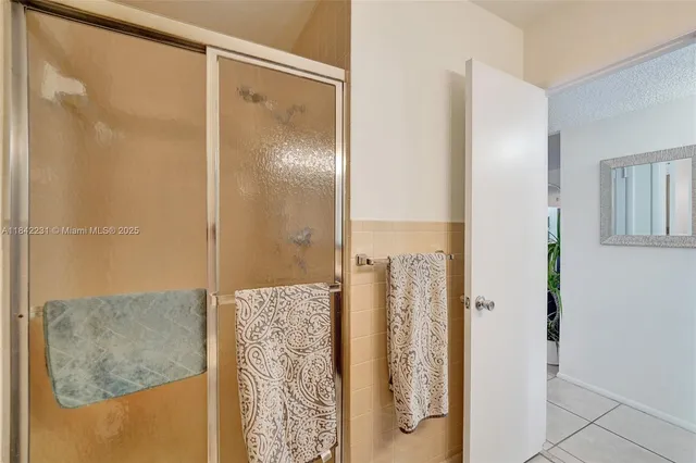 a bedroom with furniture and a wooden floor