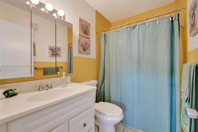 a front view of building with yard