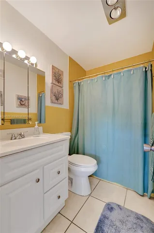 a view of a street with cars