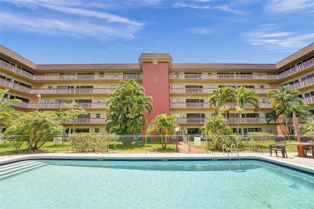a view of chair and table in the room
