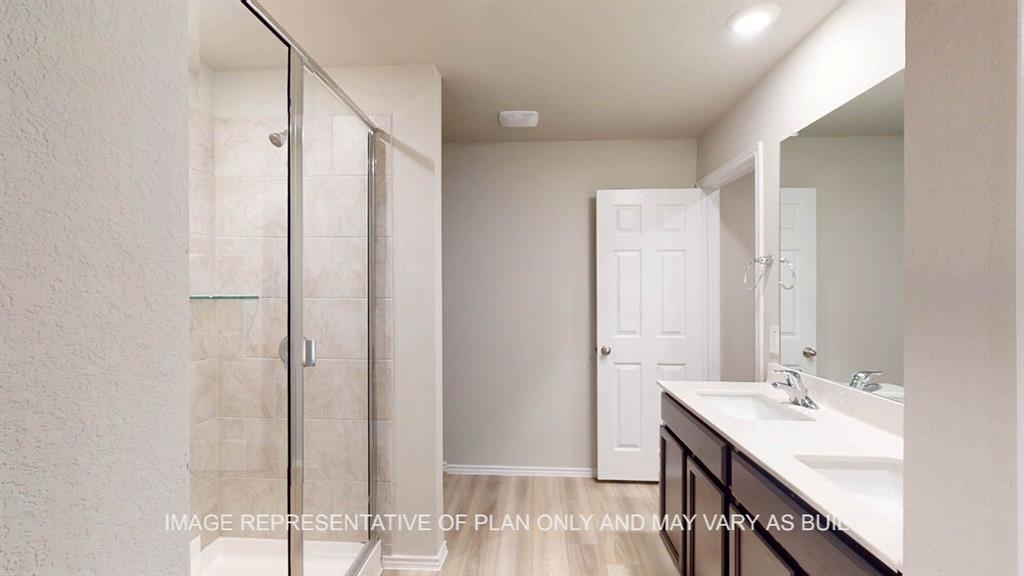 3201 Cyprian Road Lorena, TX 76655 - Photo 16 of 27 a bathroom with a sink and a mirror