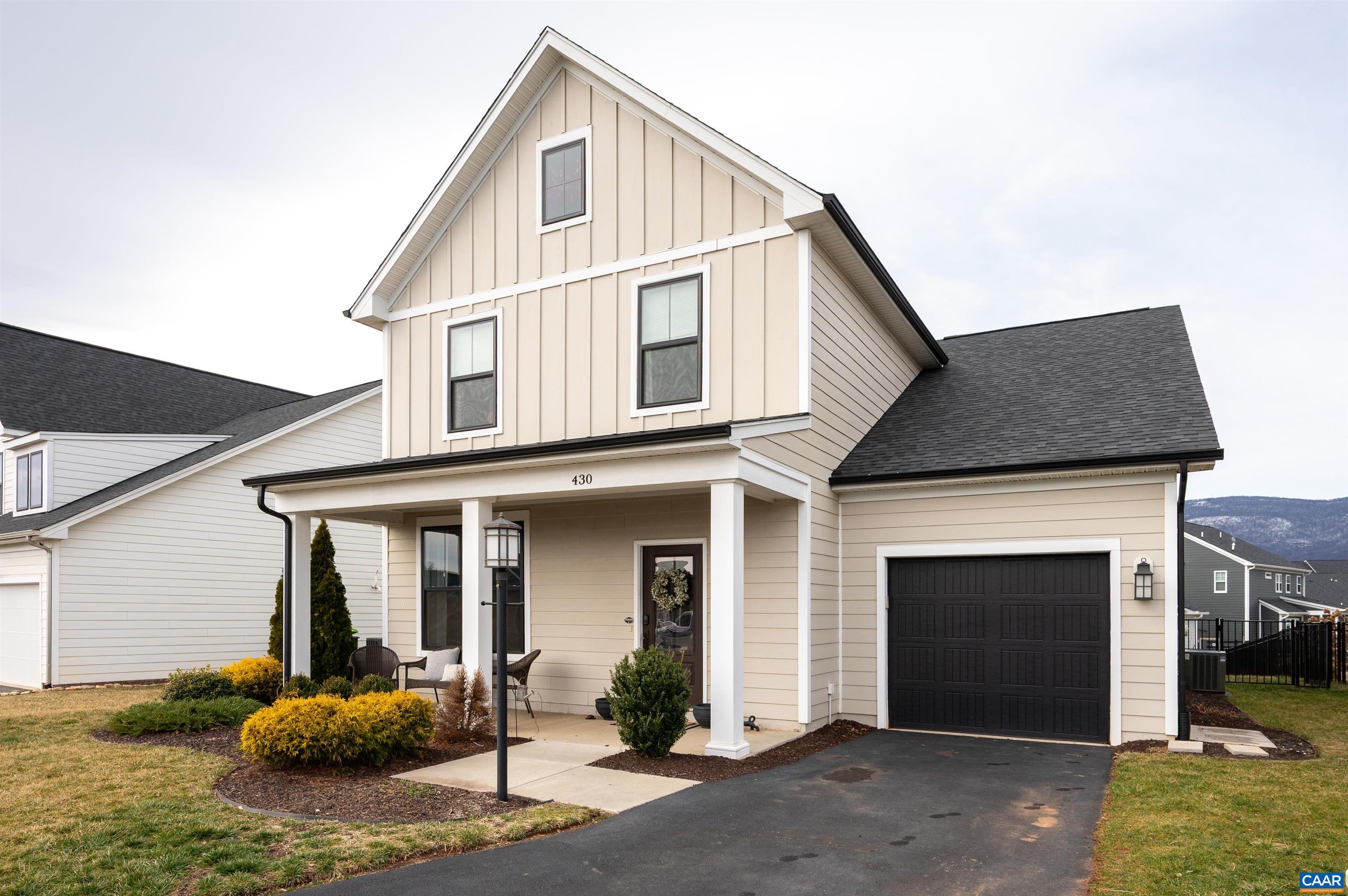 430 Claibourne Road Crozet, VA 22932 - Photo 1 of 25 a front view of a house with a yard