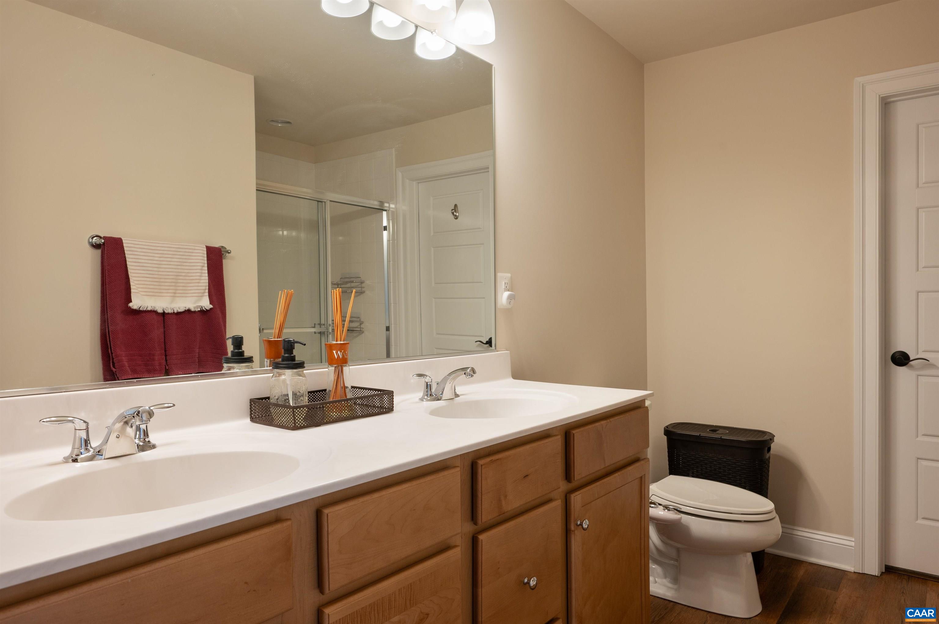 430 Claibourne Road Crozet, VA 22932 - Photo 12 of 25 a bathroom with a sink toilet and a mirror