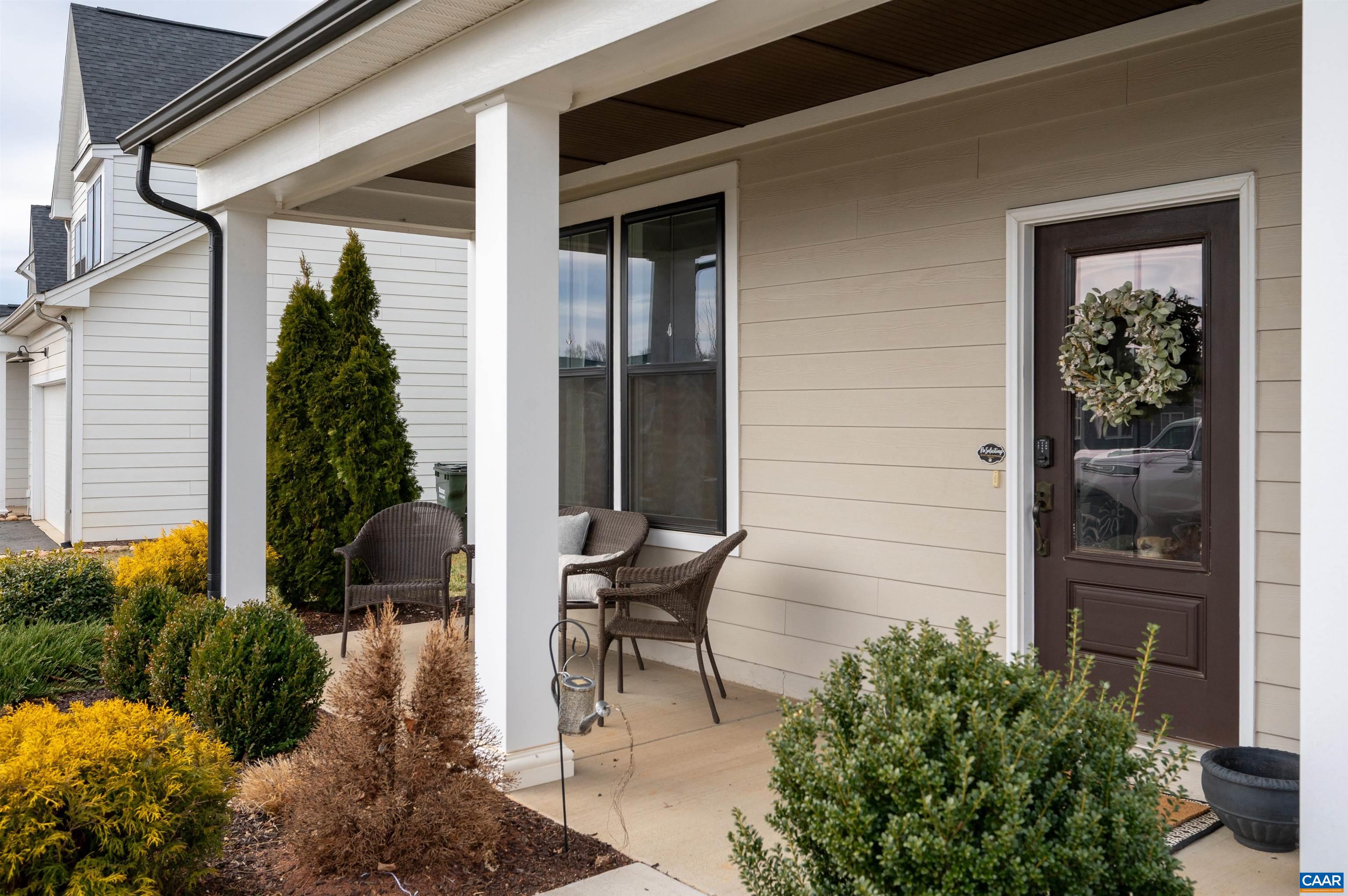 430 Claibourne Road Crozet, VA 22932 - Photo 2 of 25 a view of a chair and table in front of house