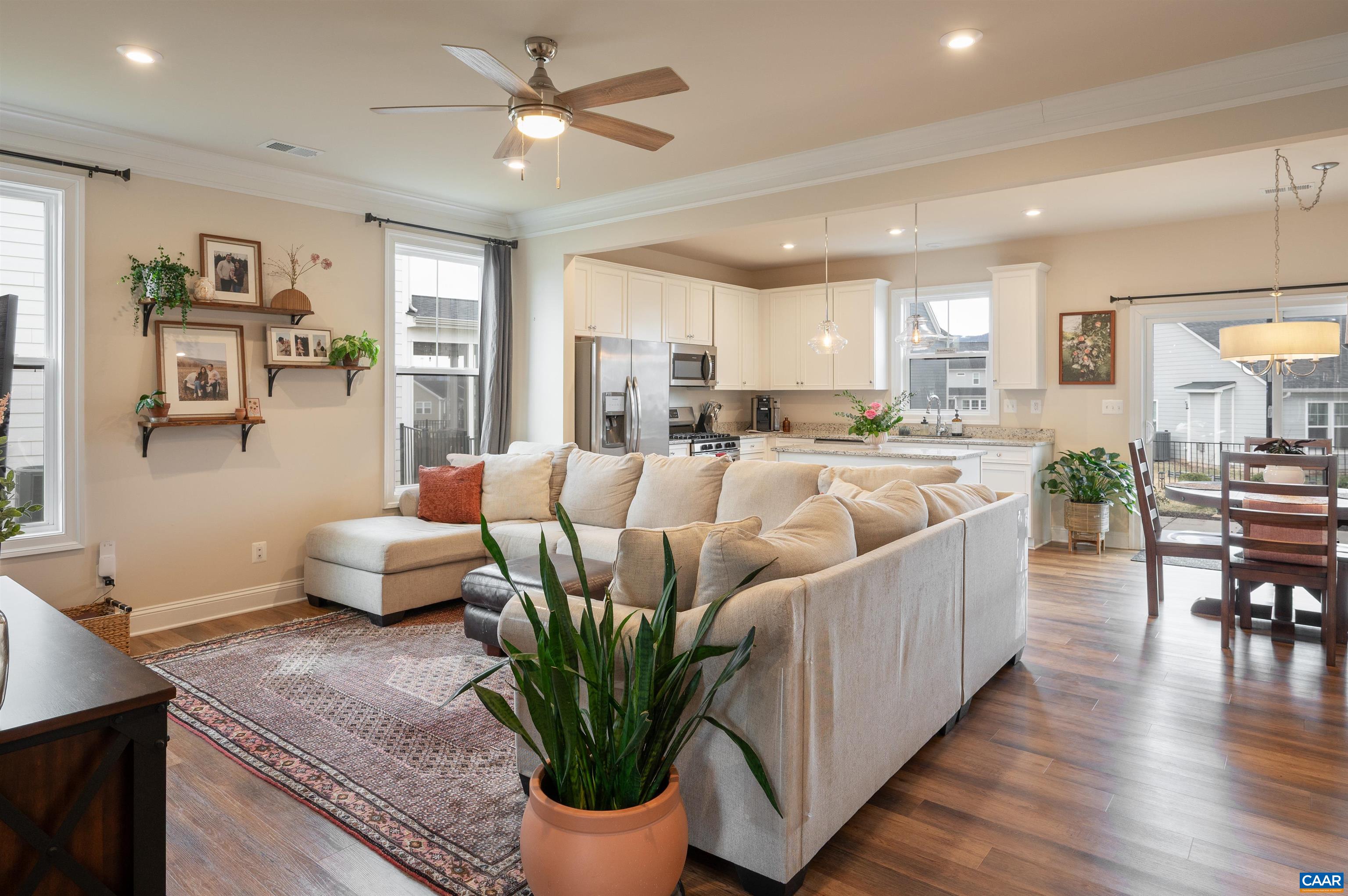 430 Claibourne Road Crozet, VA 22932 - Photo 5 of 25 a living room with furniture potted plant and kitchen view