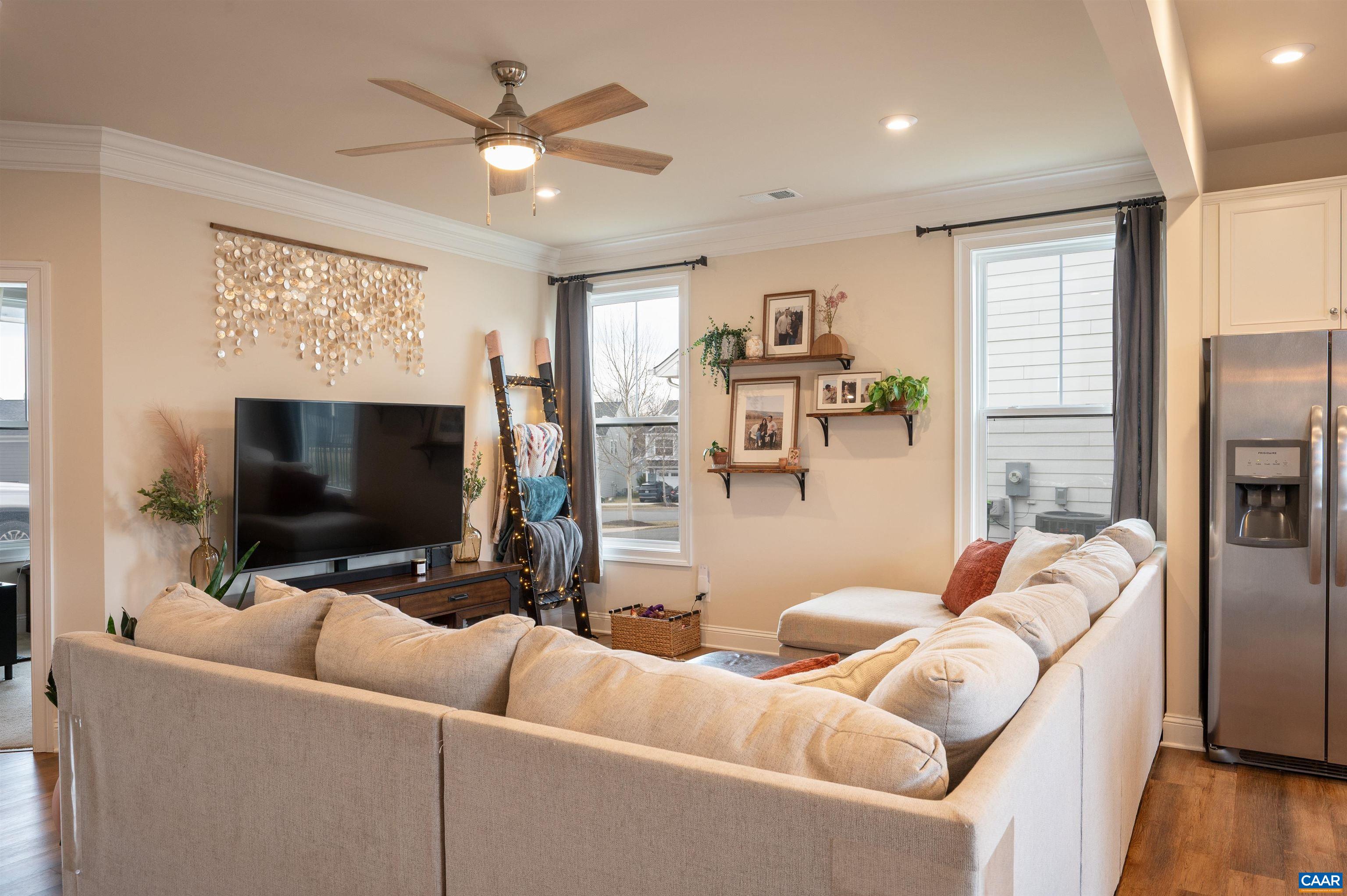 430 Claibourne Road Crozet, VA 22932 - Photo 6 of 25 a living room with furniture and a flat screen tv