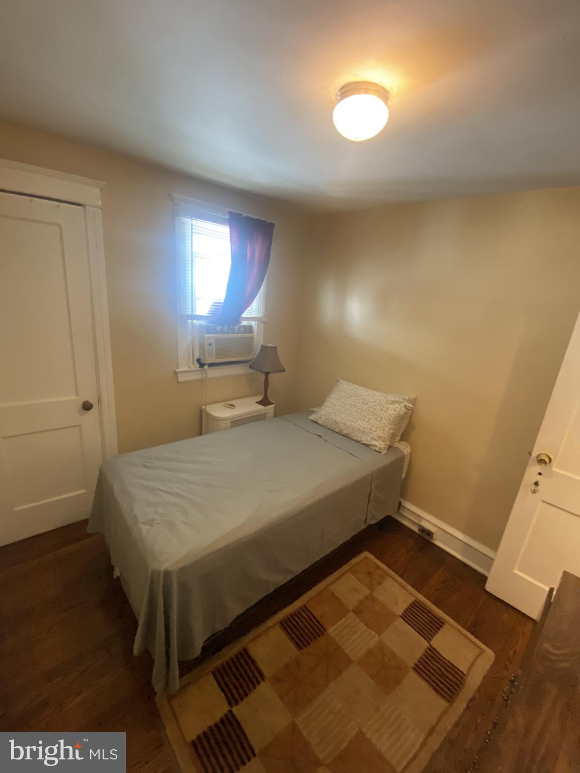 536 Cypress Street Lansdowne, PA 19050 - Photo 11 of 22 a bedroom with a bed and a window