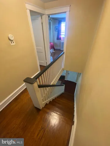 a view of entryway with wooden floor