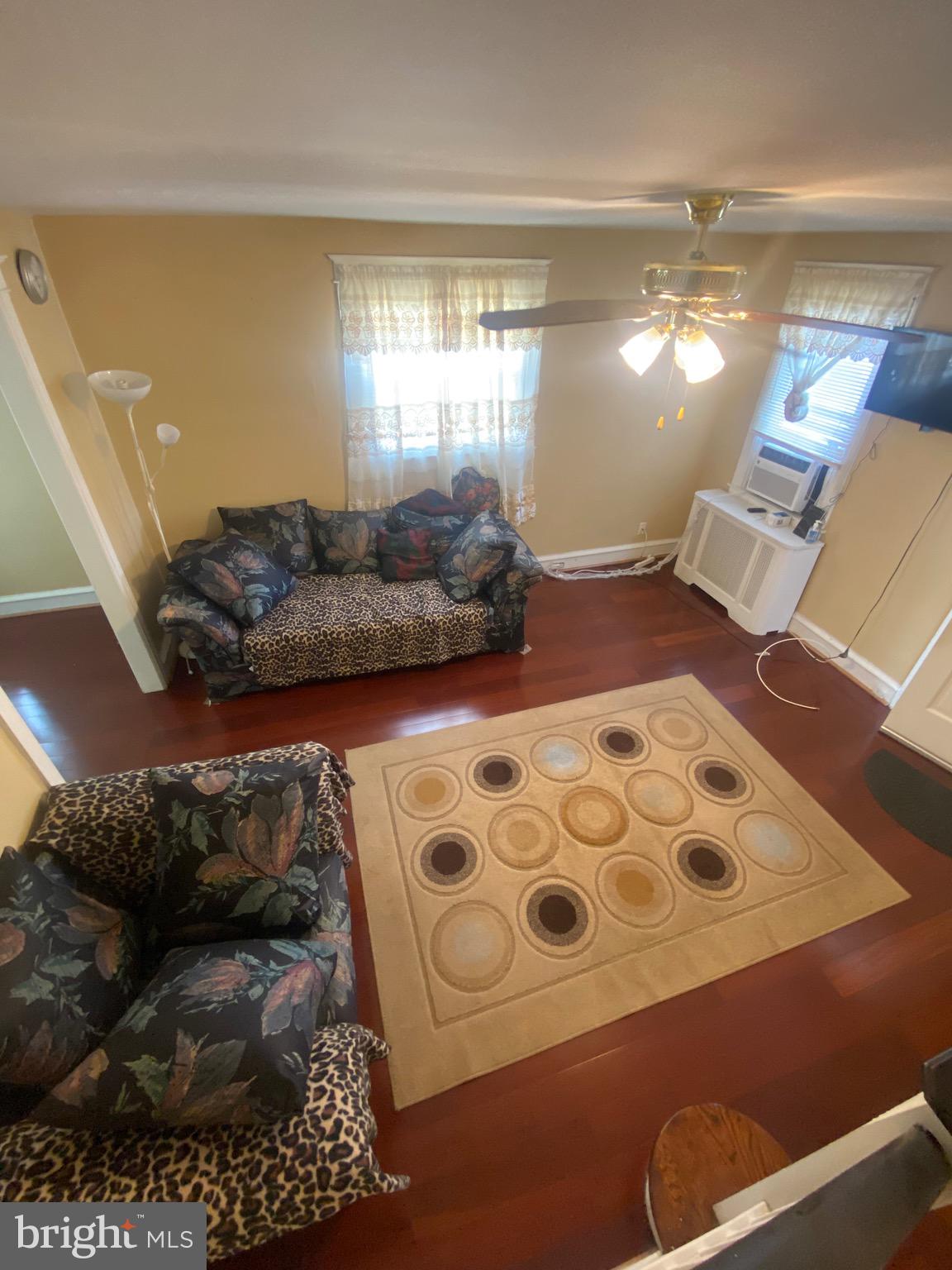536 Cypress Street Lansdowne, PA 19050 - Photo 3 of 22 a living room with furniture and a rug