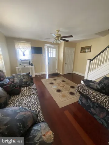 a bed sitting in a room next to a window