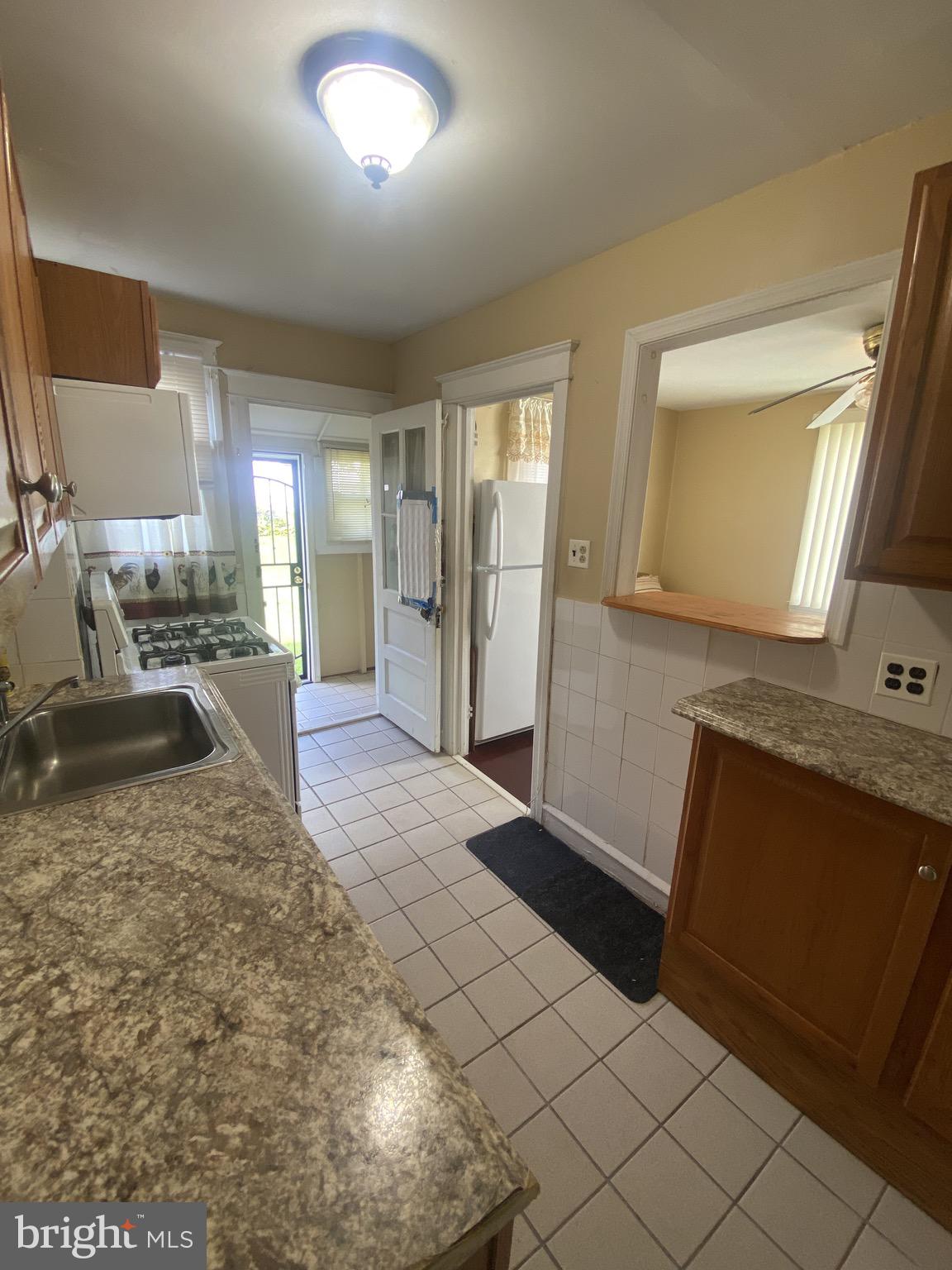 536 Cypress Street Lansdowne, PA 19050 - Photo 7 of 22 a bathroom with a sink and a mirror