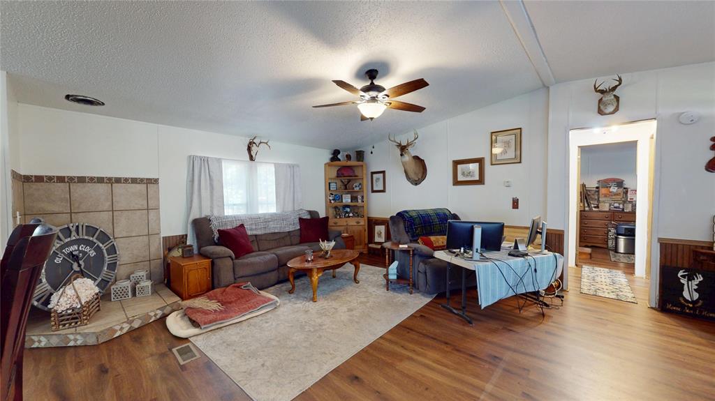 670 Arbin Culpepper Road Jonesboro, LA 71251 - Photo 10 of 17 a living room with furniture and a wooden floor