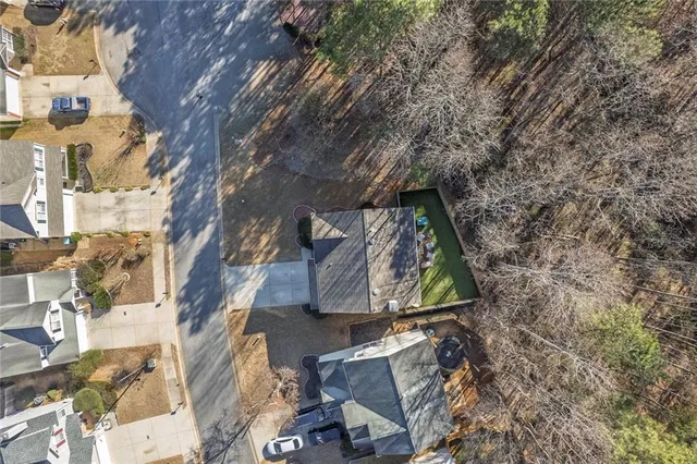 a terrace of a house with wooden floor and city view
