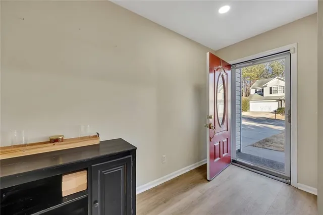 a view of room with air conditioner and window