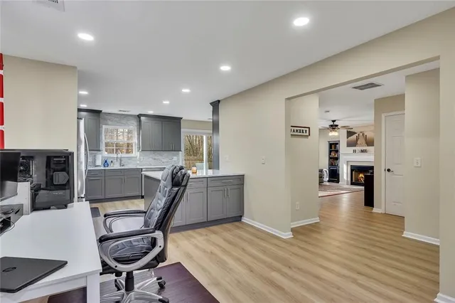 a view of a kitchen and dining room