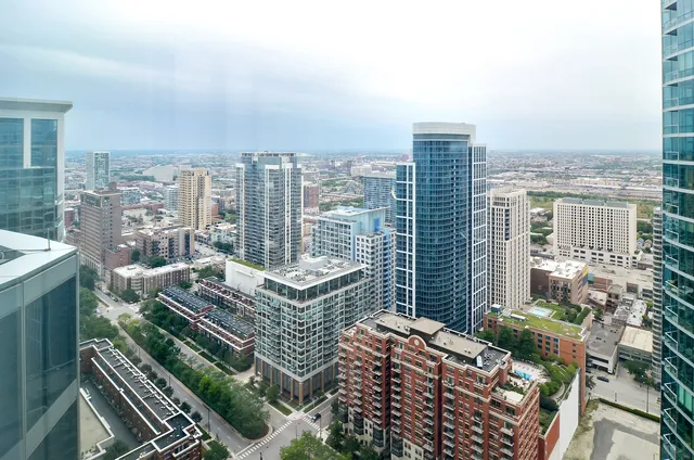 a view of city with tall buildings