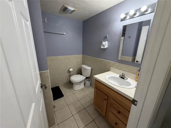 a view of a street with cars