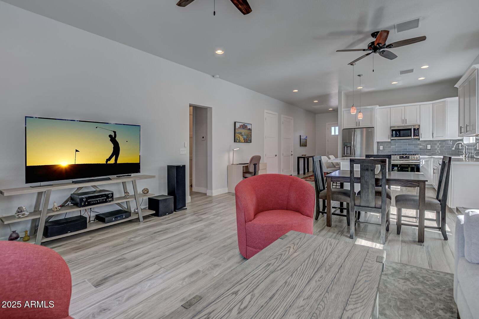 2007 East Rainbow Trail Payson, AZ 85541 - Photo 11 of 34 a living room with furniture kitchen view and a flat screen tv