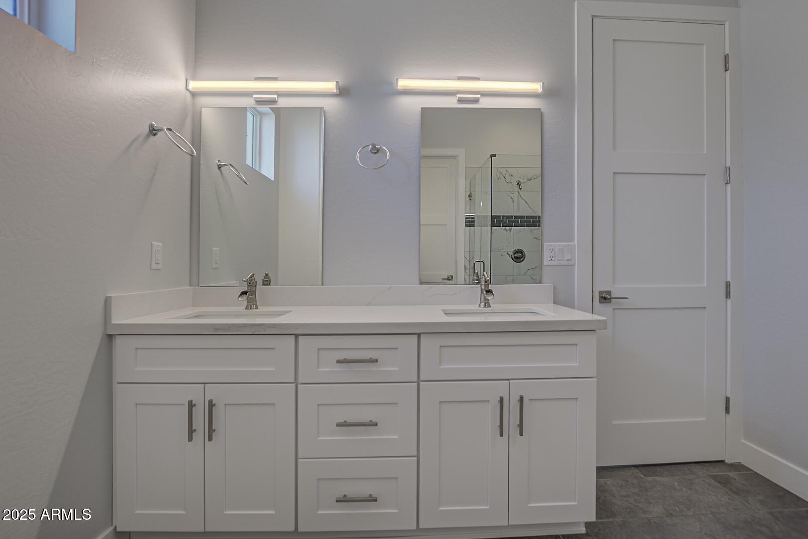 2007 East Rainbow Trail Payson, AZ 85541 - Photo 22 of 34 a bathroom with white cabinets and a sink