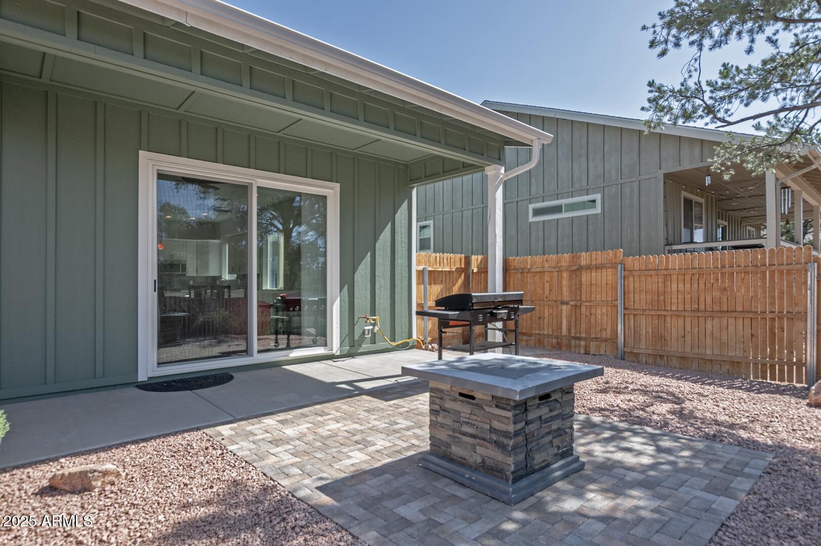 2007 East Rainbow Trail Payson, AZ 85541 - Photo 33 of 34 a building outdoor space with patio furniture and potted plants