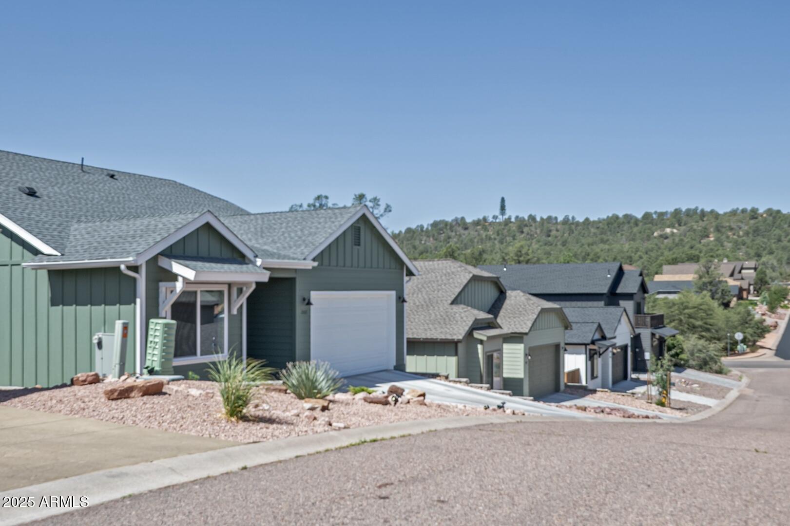 2007 East Rainbow Trail Payson, AZ 85541 - Photo 6 of 34 front view of a house with table and chairs
