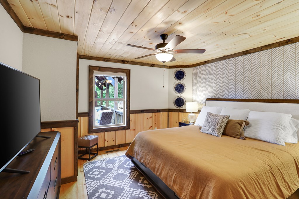 42 Old Jerusalem Road Morganton, GA 30560 - Photo 21 of 61 a bedroom with a bed and a flat screen tv