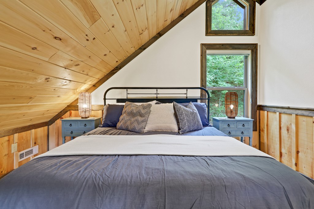 42 Old Jerusalem Road Morganton, GA 30560 - Photo 29 of 61 a bedroom with a large bed and a window