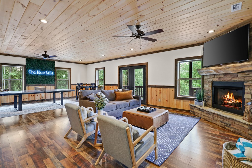 42 Old Jerusalem Road Morganton, GA 30560 - Photo 33 of 61 a living room with furniture a flat screen tv and a fireplace
