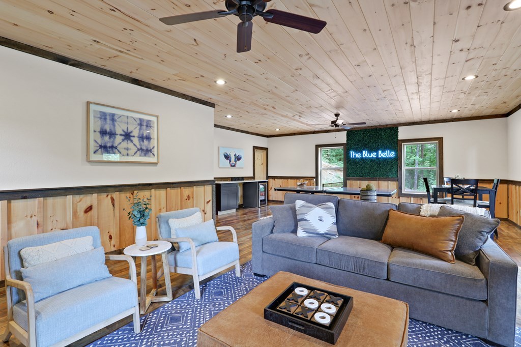42 Old Jerusalem Road Morganton, GA 30560 - Photo 34 of 61 a living room with furniture a rug and a chandelier