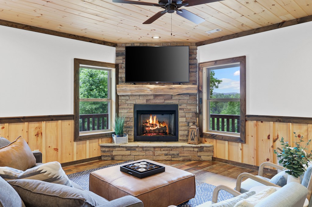 42 Old Jerusalem Road Morganton, GA 30560 - Photo 35 of 61 a living room with furniture and a fireplace