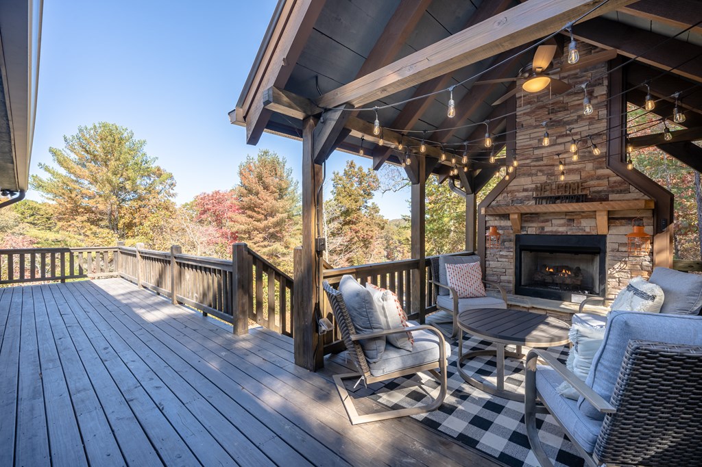 42 Old Jerusalem Road Morganton, GA 30560 - Photo 51 of 61 a view of deck with table and chairs with wooden floor and fence