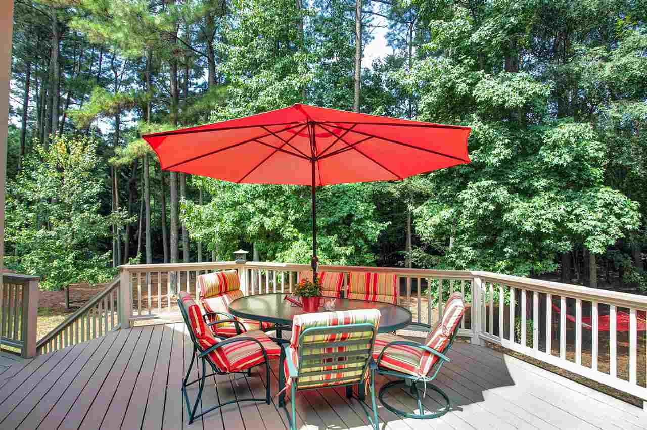 201 Release Circle Raleigh, NC 27615 - Photo 22 of 25 Enjoy a quiet family meal or entertain 20 of your closest friends on this gigantic deck. The deck extends the across the entire back of the house! Patio/Deck